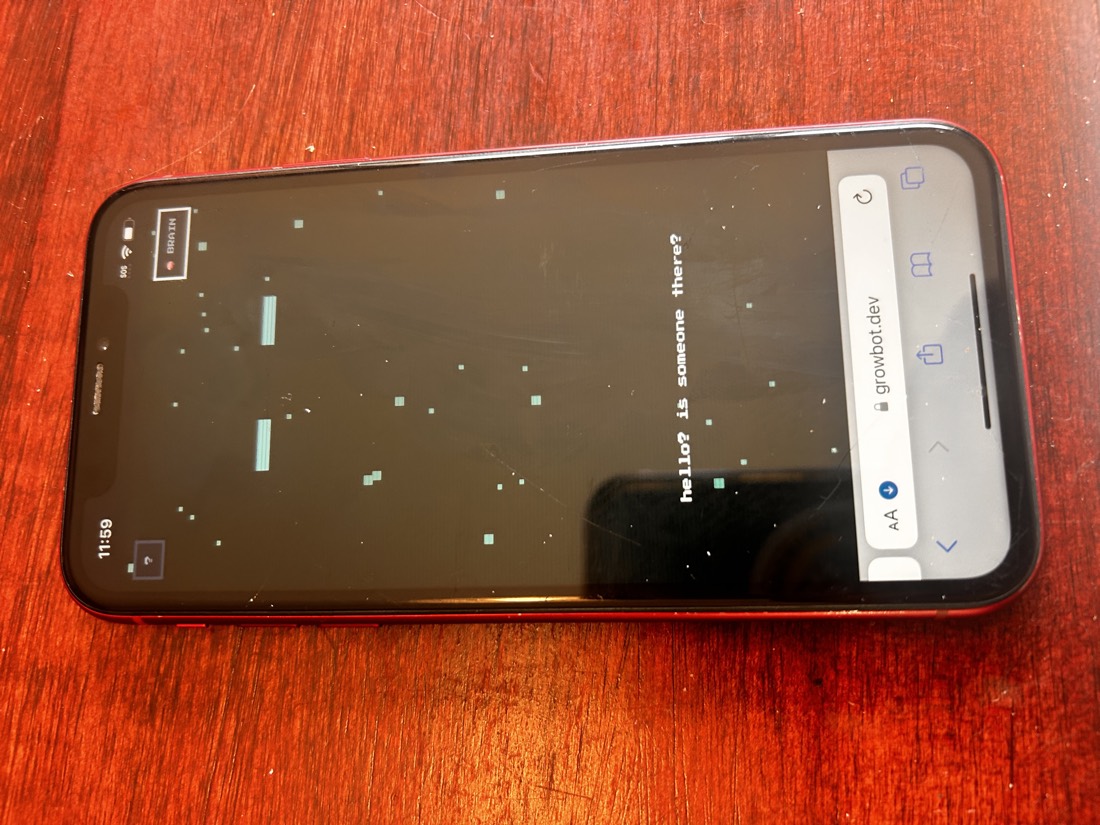 A phone lying on a table, its screen asking: hello? is someone there?